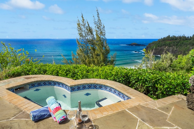 2620-A Kauapea Rd, Kilauea, HI 96754 - view of swimming pool featuring a jacuzzi and a water view