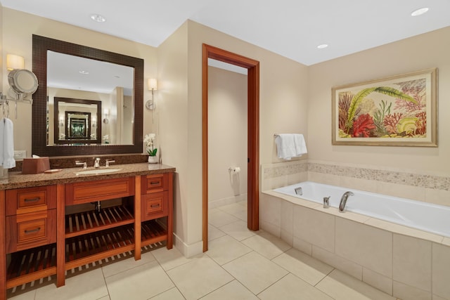bathroom featuring a bath, tile patterned floors, vanity, and recessed lighting