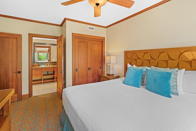 bedroom with crown molding, a ceiling fan, and a closet