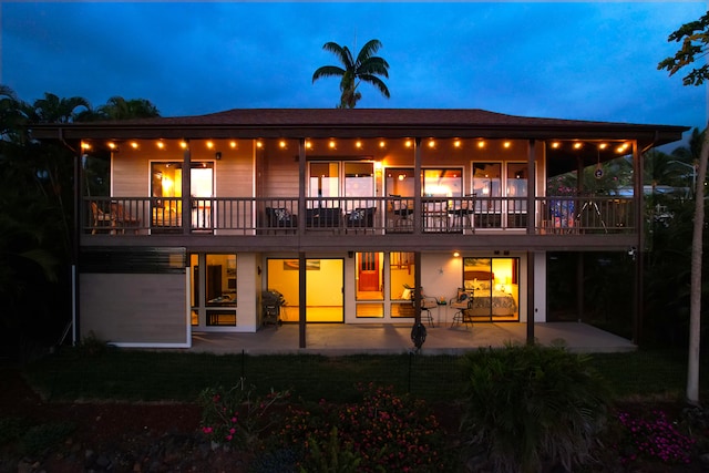 rear view of house with a patio