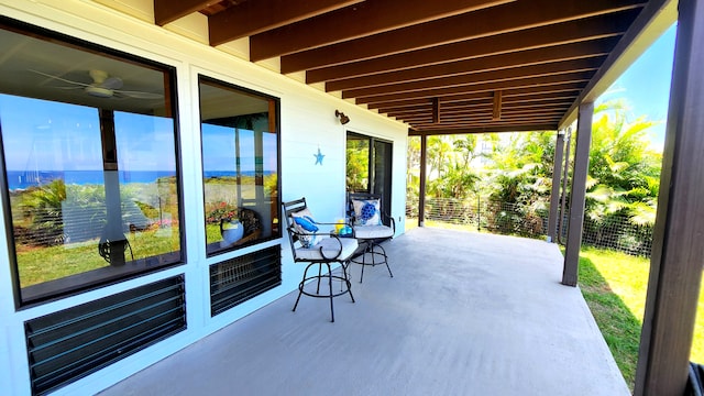 view of patio / terrace featuring fence