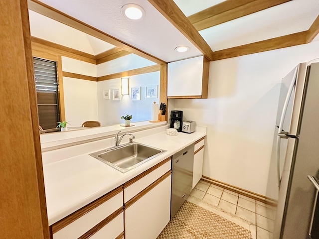 2253 Poipu Rd Unit 446, Koloa, HI 96756 - kitchen with a sink, freestanding refrigerator, dishwashing machine, white cabinetry, and light countertops