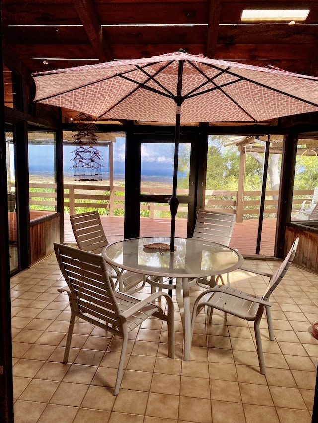 68-1753 Laie Pl, Waikoloa, HI 96738 - sunroom with tile patterned flooring, outdoor dining area, and beamed ceiling