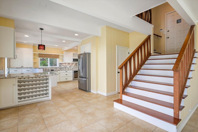 77-6486 Walua Rd, Kailua-Kona, HI 96740 - kitchen featuring stainless steel appliances, open shelves, white cabinets, light stone countertops, and backsplash
