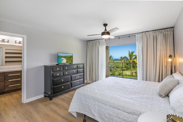 bedroom with wood finished floors, baseboards, and ceiling fan