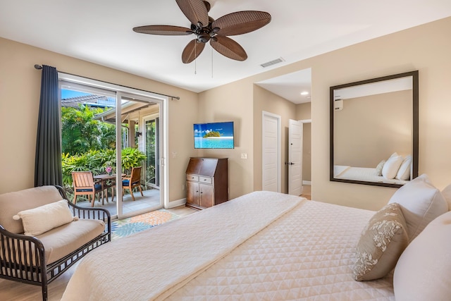 68-1122-N Kaniku Dr Unit 501591, Kamuela, HI 96743 - bedroom featuring access to exterior, baseboards, light wood-type flooring, and ceiling fan