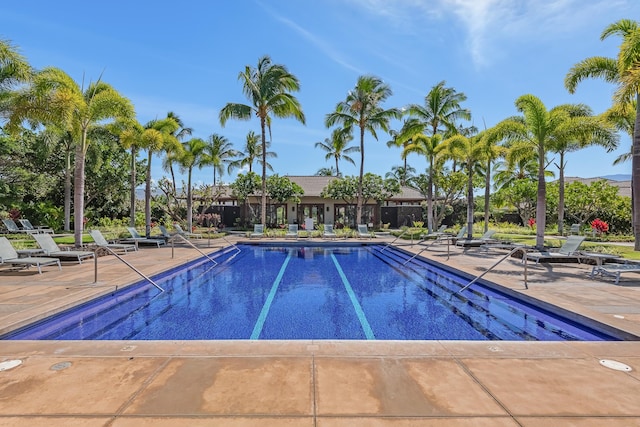 68-1122-N Kaniku Dr Unit 501591, Kamuela, HI 96743 - community pool featuring a patio area