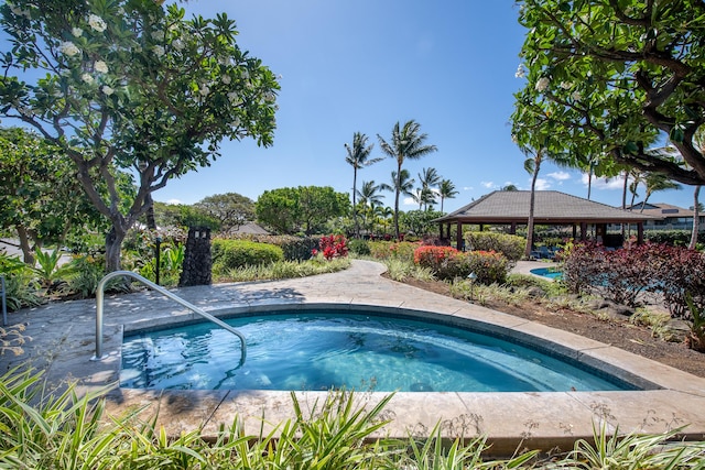 68-1122-N Kaniku Dr Unit 501591, Kamuela, HI 96743 - view of pool featuring an in-ground hot tub, a gazebo, and a swimming pool