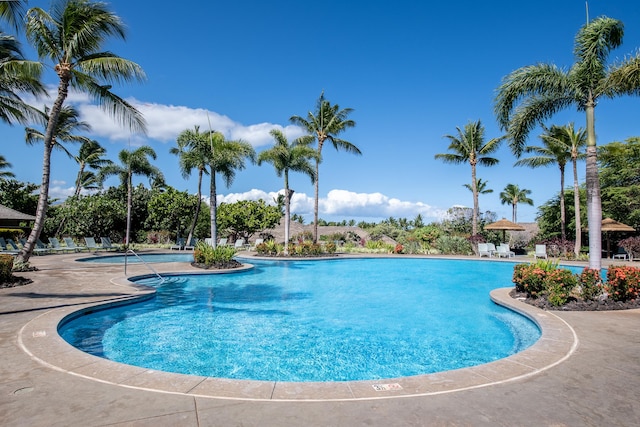 68-1122-N Kaniku Dr Unit 501591, Kamuela, HI 96743 - community pool with a patio