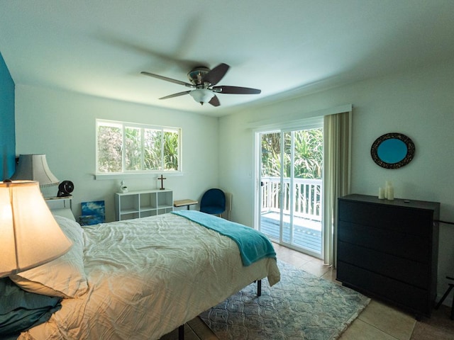 15-1519 14th Ave, Keaau, HI 96749 - tiled bedroom featuring access to exterior, multiple windows, and a ceiling fan