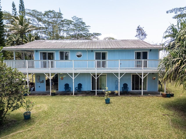 15-1519 14th Ave, Keaau, HI 96749 - back of house with a yard, a patio area, metal roof, and a wooden deck