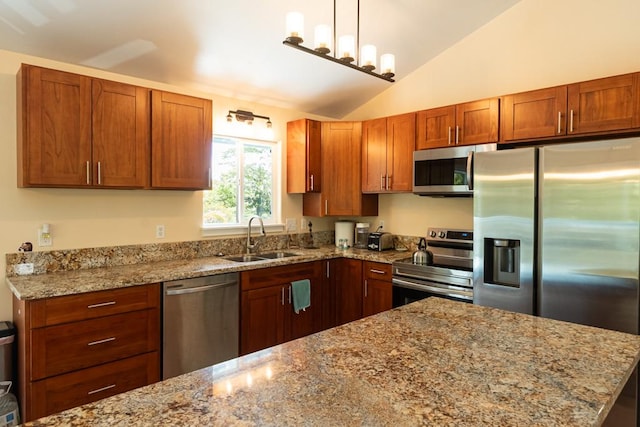 15-1519 14th Ave, Keaau, HI 96749 - kitchen featuring appliances with stainless steel finishes, a sink, vaulted ceiling, light stone countertops, and decorative light fixtures