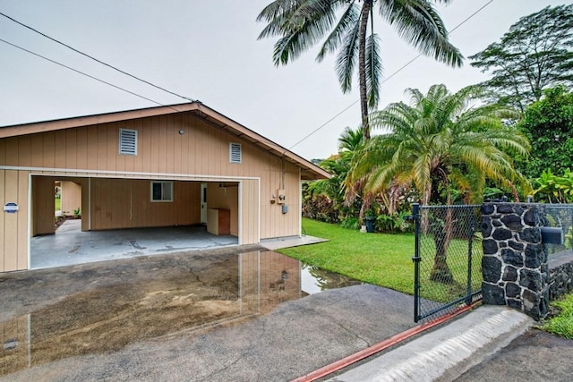 garage featuring a yard