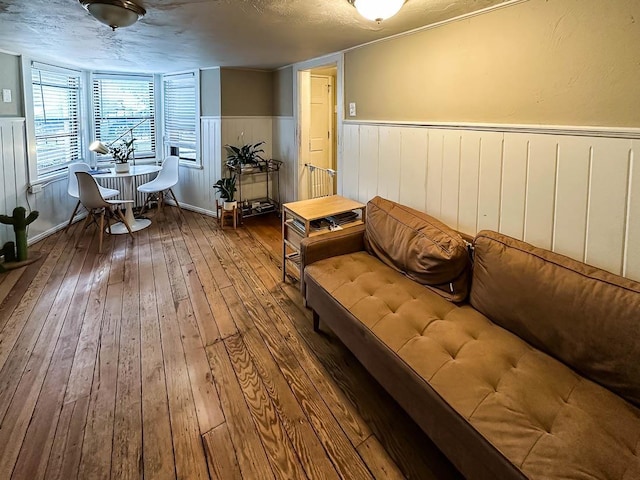 interior space featuring hardwood / wood-style floors and a textured ceiling