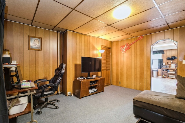 73 Laidlaw Ave, Jersey City, NJ 07306 - carpeted office featuring wood walls and a drop ceiling