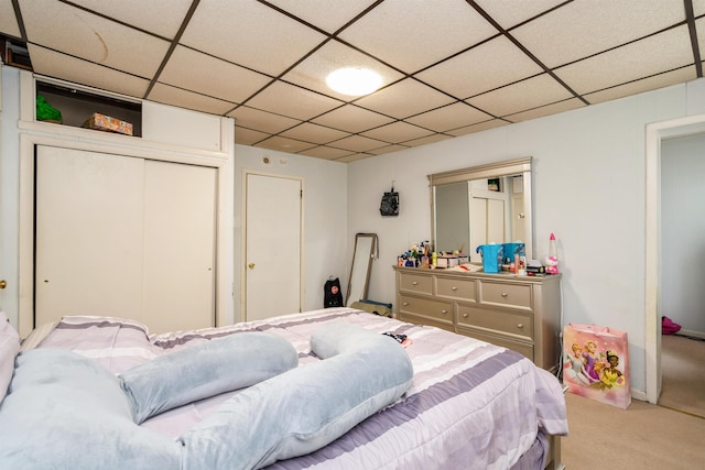 73 Laidlaw Ave, Jersey City, NJ 07306 - bedroom with carpet flooring, a paneled ceiling, and a closet