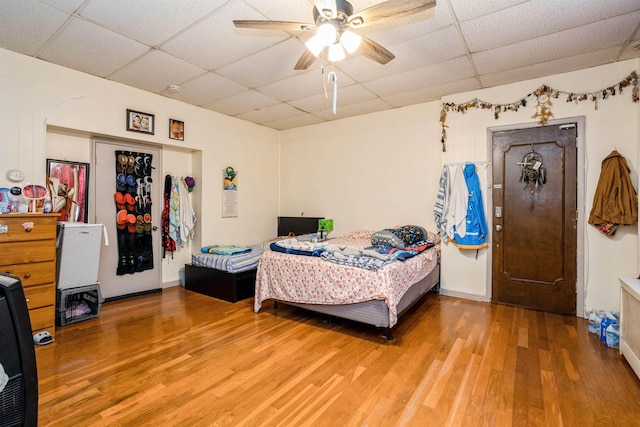 73 Laidlaw Ave, Jersey City, NJ 07306 - bedroom with a drop ceiling, light wood-type flooring, and ceiling fan