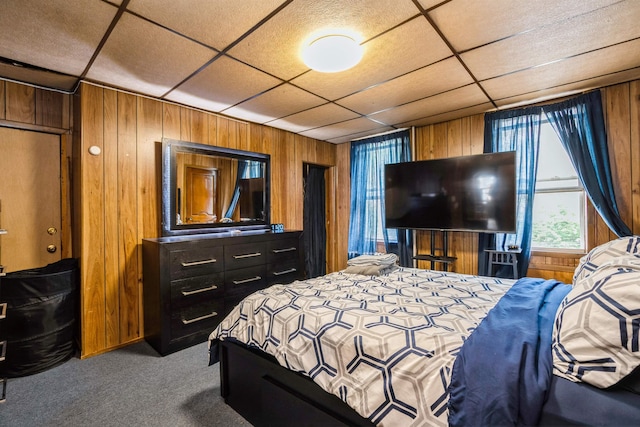 73 Laidlaw Ave, Jersey City, NJ 07306 - bedroom featuring wooden walls, carpet floors, and a paneled ceiling