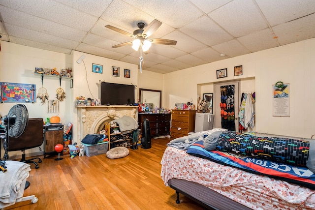 73 Laidlaw Ave, Jersey City, NJ 07306 - bedroom featuring a drop ceiling, wood finished floors, and ceiling fan