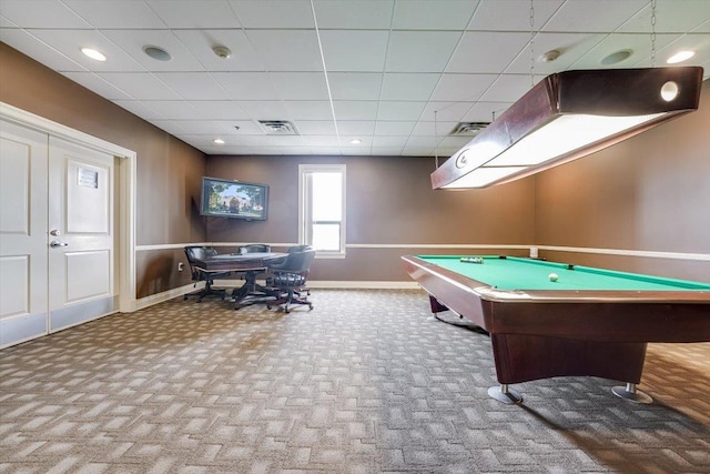 playroom with a drop ceiling, visible vents, baseboards, and carpet