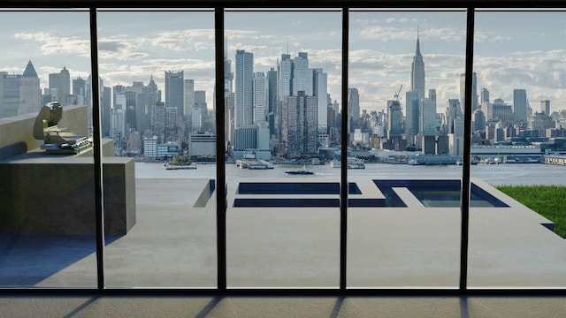 58 King Ave, Weehawken, NJ 07086 - interior space with a skyline view and floor to ceiling windows