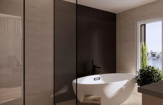 58 King Ave, Weehawken, NJ 07086 - full bathroom with a freestanding bath and tile walls