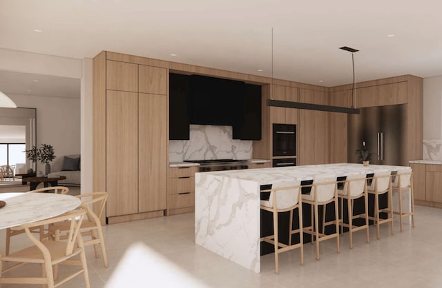 58 King Ave, Weehawken, NJ 07086 - kitchen with modern cabinets, a large island, light brown cabinetry, and a kitchen bar