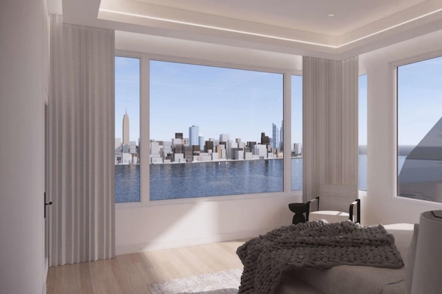 58 King Ave, Weehawken, NJ 07086 - sitting room with plenty of natural light, wood finished floors, and a view of skyline