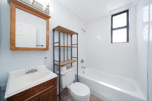 bathroom with vanity, toilet, and bathtub / shower combination