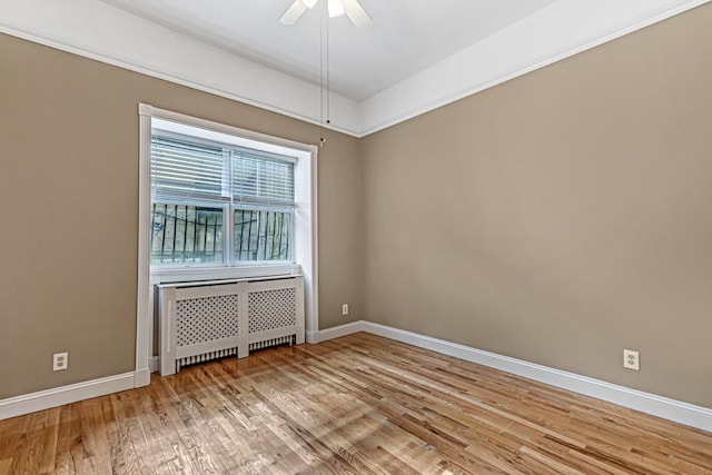 531 Bloomfield St Unit 1, Hoboken, NJ 07030 - spare room with radiator, light wood finished floors, baseboards, and ceiling fan