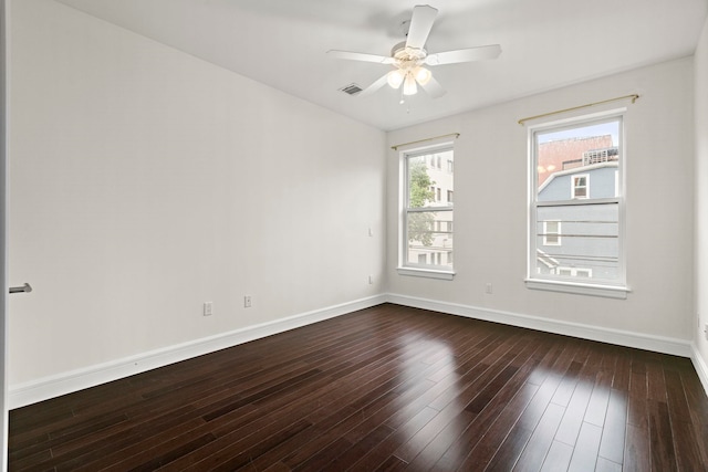 471 Monmouth St Unit 1, Jersey City, NJ 07302 - unfurnished room featuring baseboards, ceiling fan, and dark wood-style floors