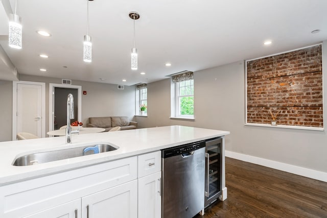 126 Delaware Ave Unit 10, Jersey City, NJ 07306 - kitchen featuring dishwasher, a sink, wine cooler, baseboards, and dark wood-type flooring