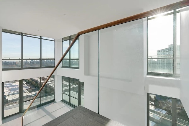 320 Adolphus Ave Unit 316, Cliffside Park, NJ 07010 - stairway with healthy amount of natural light, tile patterned floors, and a view of city
