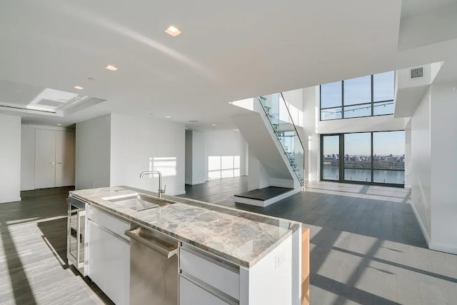 320 Adolphus Ave Unit 316, Cliffside Park, NJ 07010 - kitchen with a sink, open floor plan, beverage cooler, wood finished floors, and recessed lighting