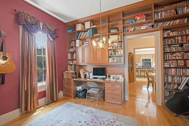 91 Sherman Pl, Jersey City, NJ 07307 - office with light wood-type flooring, baseboards, and built in shelves