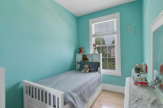 91 Sherman Pl, Jersey City, NJ 07307 - bedroom featuring light wood finished floors and baseboards