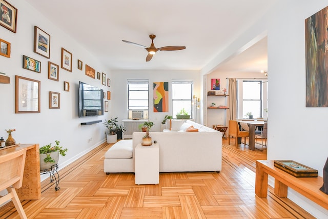 29 51st St Unit B5, Weehawken, NJ 07086 - living room featuring ceiling fan, radiator heating unit, and cooling unit