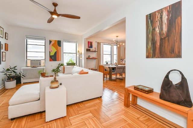 29 51st St Unit B5, Weehawken, NJ 07086 - living area with radiator, a chandelier, ceiling fan, and cooling unit