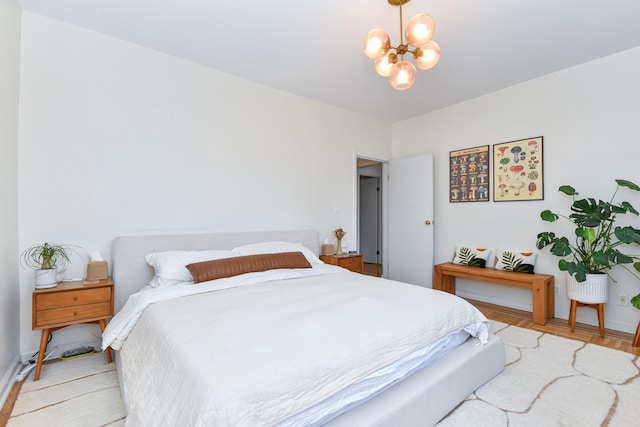 29 51st St Unit B5, Weehawken, NJ 07086 - bedroom with a chandelier and baseboards