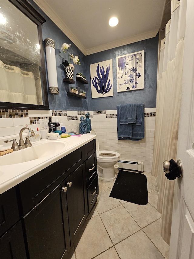 bathroom with a baseboard radiator, tile patterned floors, vanity, tile walls, and ornamental molding