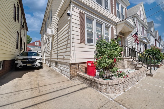 159 W 33rd St, Bayonne, NJ 07002 - view of side of home featuring a residential view and cooling unit