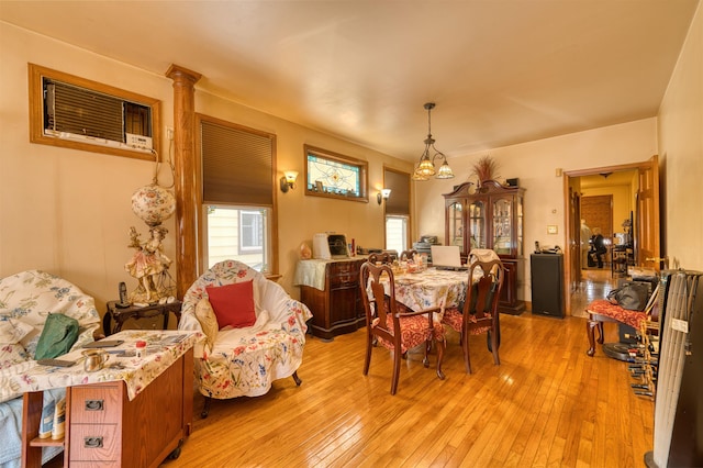 159 W 33rd St, Bayonne, NJ 07002 - dining room with light wood-style flooring and a wall mounted AC