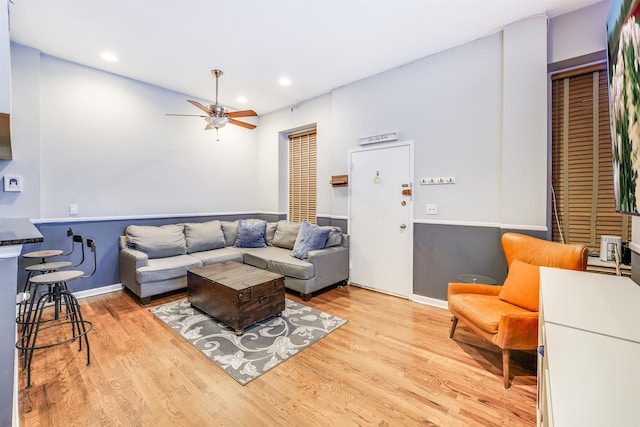 living area featuring light wood-style floors, recessed lighting, and ceiling fan