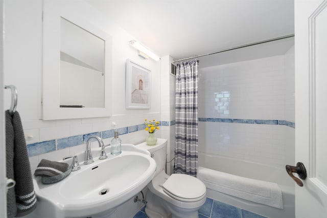 83 Montgomery St Unit 201, Jersey City, NJ 07302 - bathroom featuring shower / tub combo and tile patterned floors