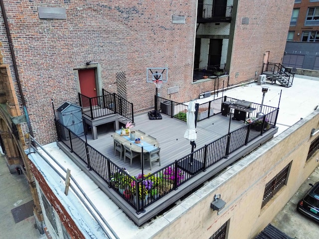 83 Montgomery St Unit 201, Jersey City, NJ 07302 - wooden terrace featuring outdoor dining space