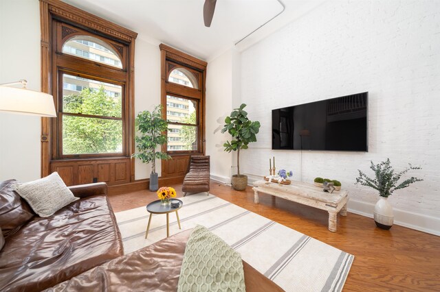 83 Montgomery St Unit 201, Jersey City, NJ 07302 - living area featuring wood finished floors and ceiling fan
