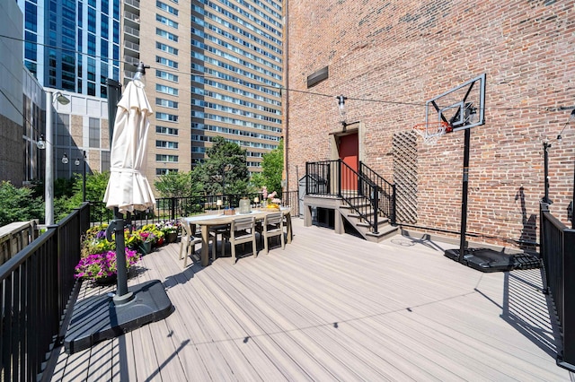83 Montgomery St Unit 201, Jersey City, NJ 07302 - wooden deck with outdoor dining area