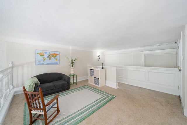 83 Montgomery St Unit 201, Jersey City, NJ 07302 - living room featuring carpet and a decorative wall