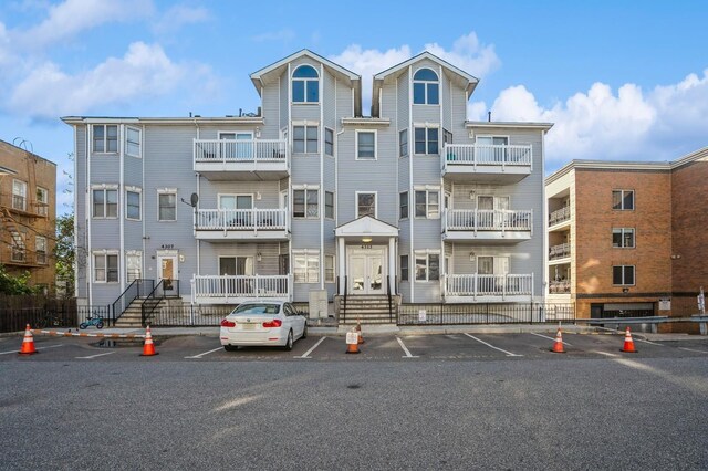 4313 Smith Ave Unit 10, North Bergen, NJ 07047 - view of apartment building / complex with uncovered parking
