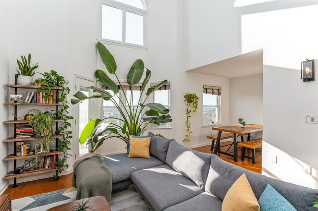 4313 Smith Ave Unit 10, North Bergen, NJ 07047 - living area with a towering ceiling and wood finished floors